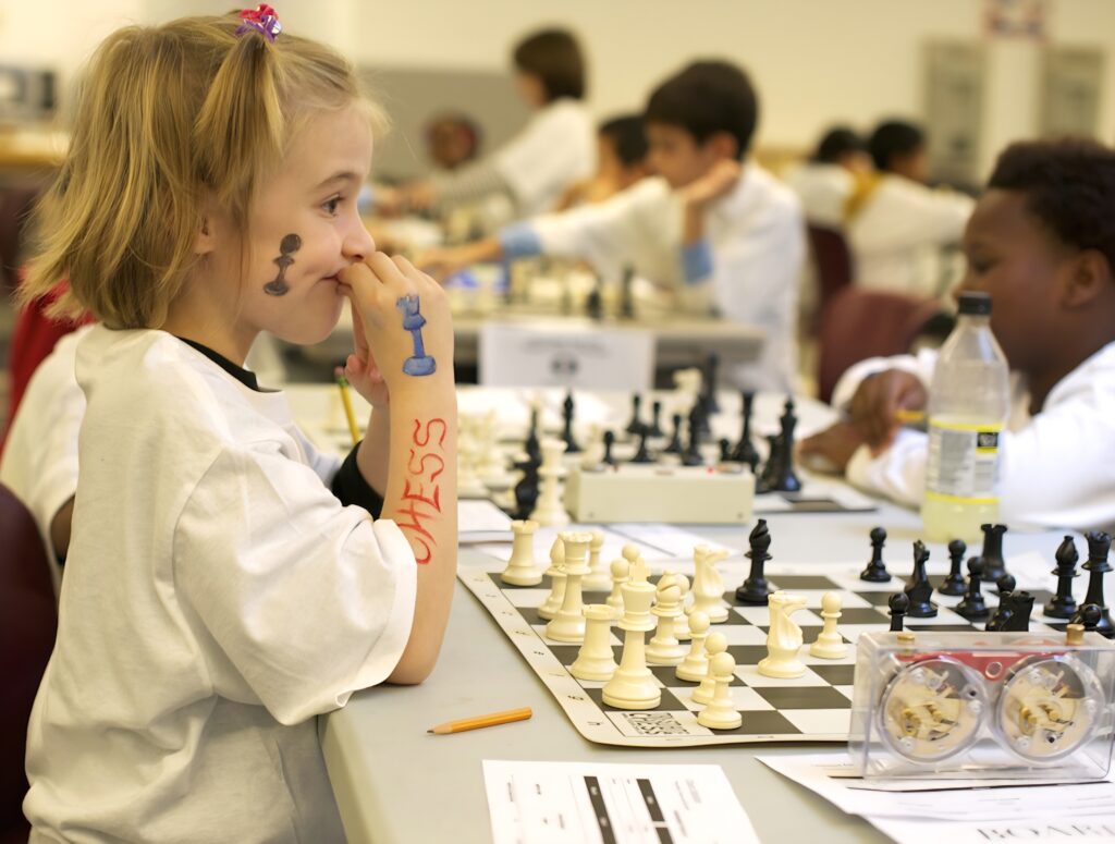 Children playing chess during a chess club activity in Antalya